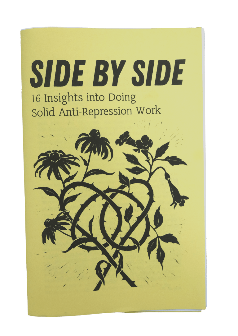the zine "side by side: 16 insights into doing solid anti-repression work". the zine is printed on yellow paper and the cover illustration is a block print style image of flowers with intertwined spiky stems.
